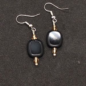 Champagne and caviar black and gold earrings!